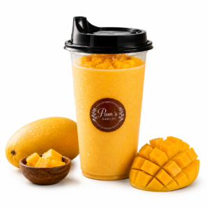 Pam’s Bakery mango shake with fresh mango pieces and ripe mangoes
